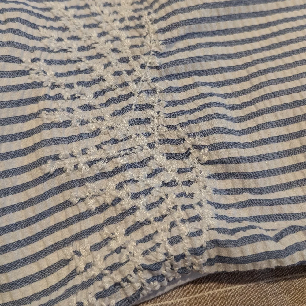 Pair of Nicole Miller embroidered seersucker cotton stripe shams